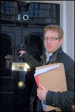 Sean Figg takes the Youth Fight for Jobs petition to Downing Street, photo Sarah Mayo Sean Figg takes the Youth Fight for Jobs petition to Downing Street, photo Sarah Mayo