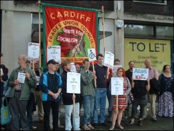 Disabled people, family members and anti-cuts campaigners took a protest to the Atos assessment centre in Swansea, photo Swansea Socialist Party