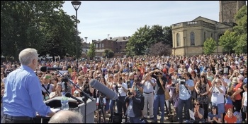 Jeremy Corbyn speaking to one of many mass audiences, photo by Steve Score