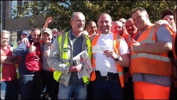 Socialist Party and PCS union activist Bill Murray presented a strike fund donation from the Socialist Party meeting to bin workers' rep Richard on the picket line at Tyseley today.   Very soon afterwards news reached the strikers that the action was susp