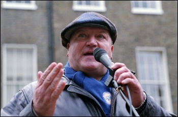 Bob Crow, RMT general secretary, speaking at the London anti-cuts demonstration jointly called by the NSSN, RMT, NUT, FBU, PCS and other unions, photo Paul Mattsson